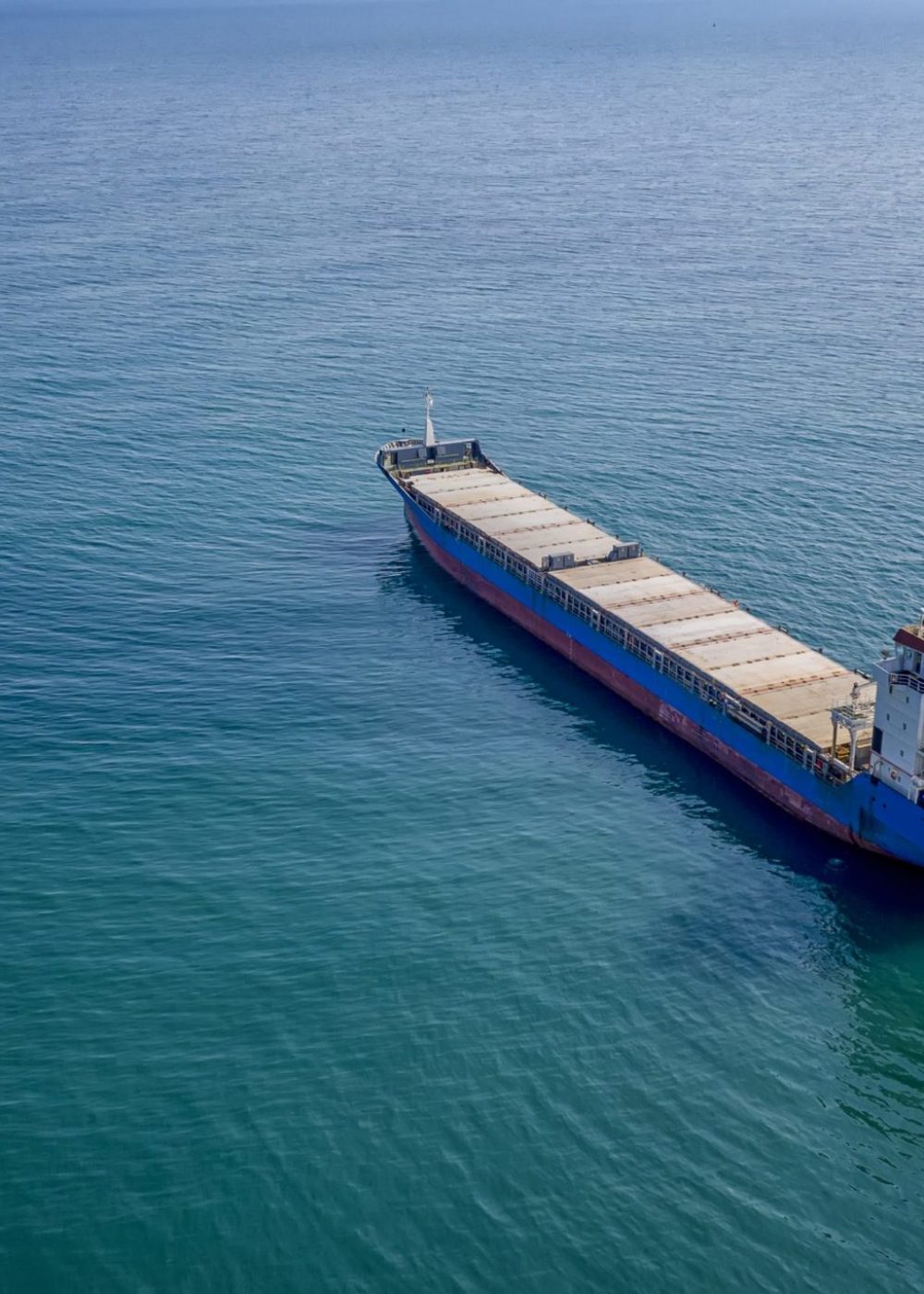 Large container ship at sea. Aerial top view of cargo container ship vessel import export container sailing.